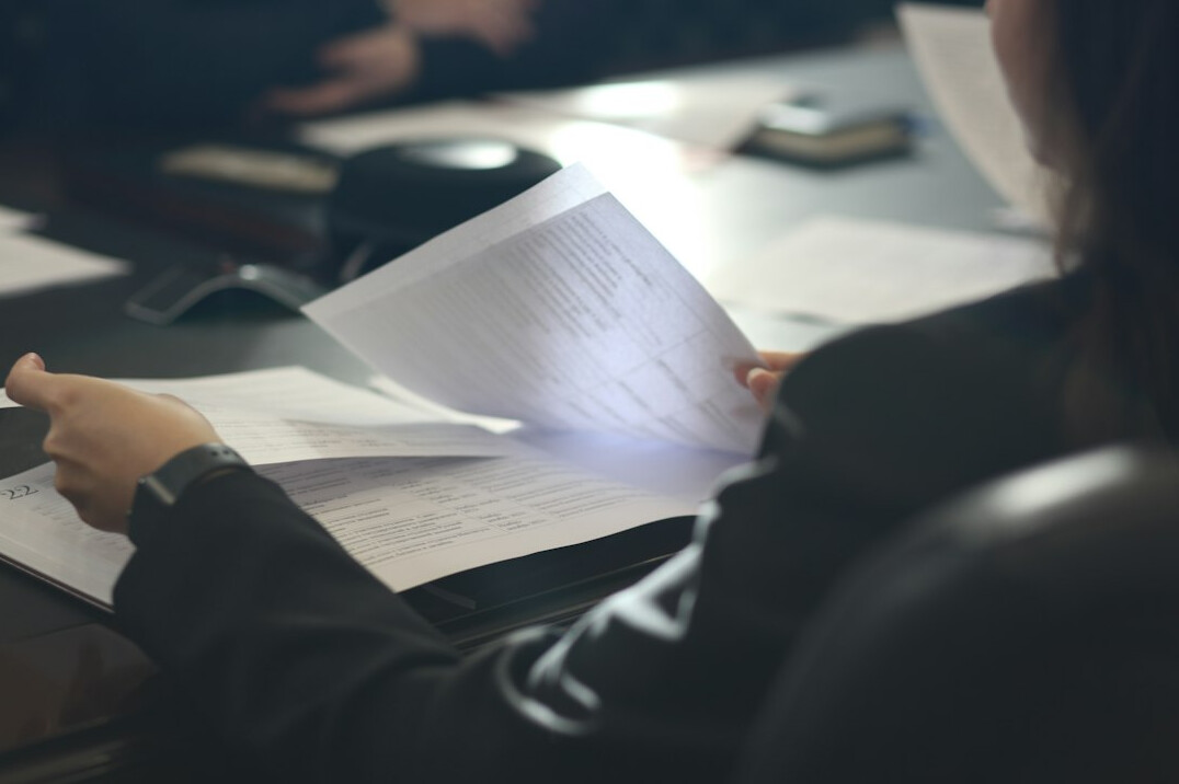 person reviewing documents